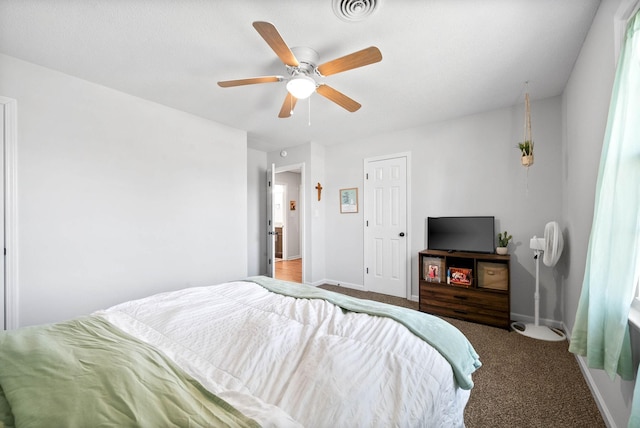 carpeted bedroom with ceiling fan