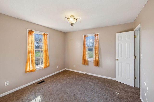 view of carpeted spare room