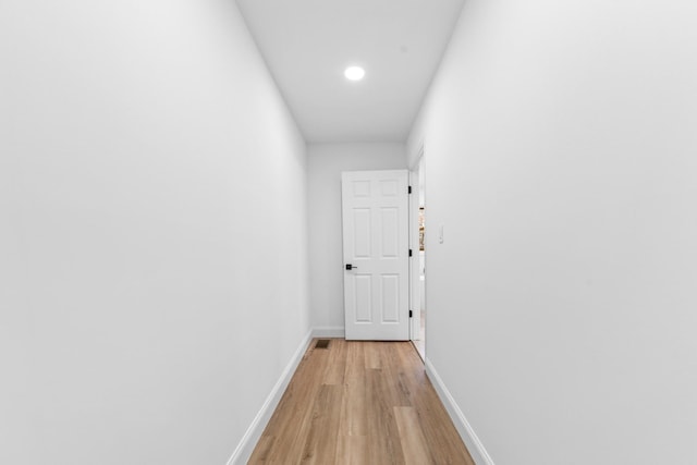 corridor featuring light wood-type flooring