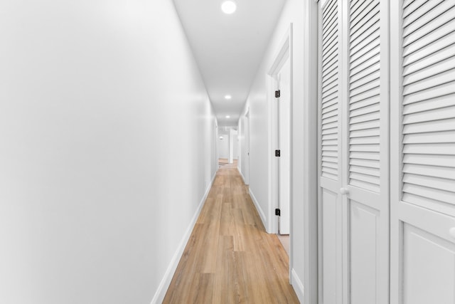 corridor featuring light wood-type flooring