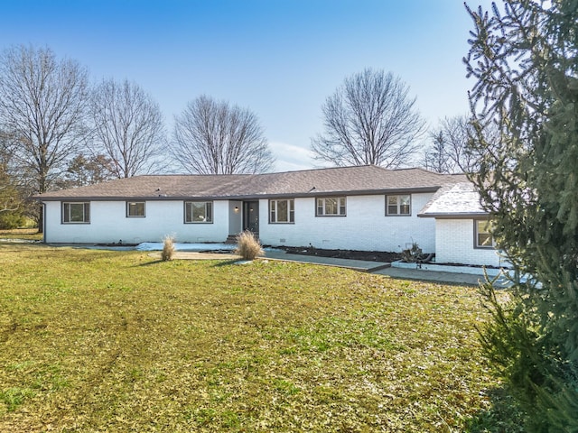 view of front of home with a front yard