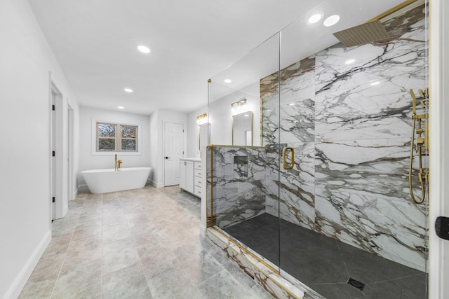 bathroom featuring vanity and independent shower and bath