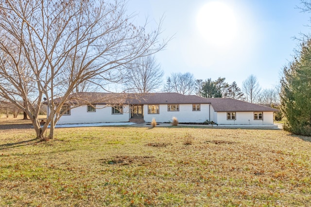 view of front of home with a front lawn