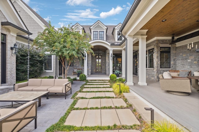 view of patio / terrace featuring covered porch and an outdoor living space