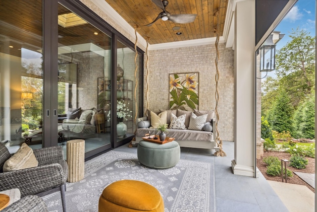 view of patio / terrace featuring ceiling fan and french doors