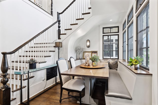 dining area with dark wood-type flooring and breakfast area