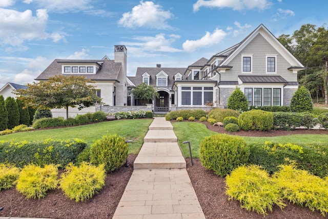 view of front of property with a front lawn