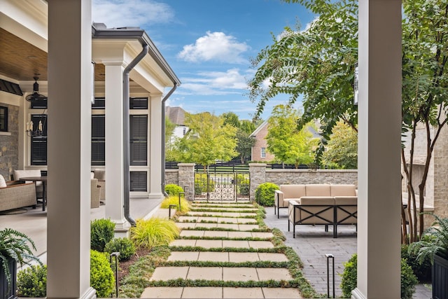 view of yard featuring a patio and outdoor lounge area