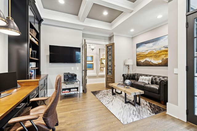 office with beam ceiling, ornamental molding, light hardwood / wood-style floors, and coffered ceiling