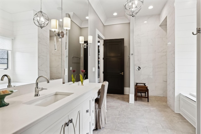 bathroom with vanity, walk in shower, crown molding, and a notable chandelier