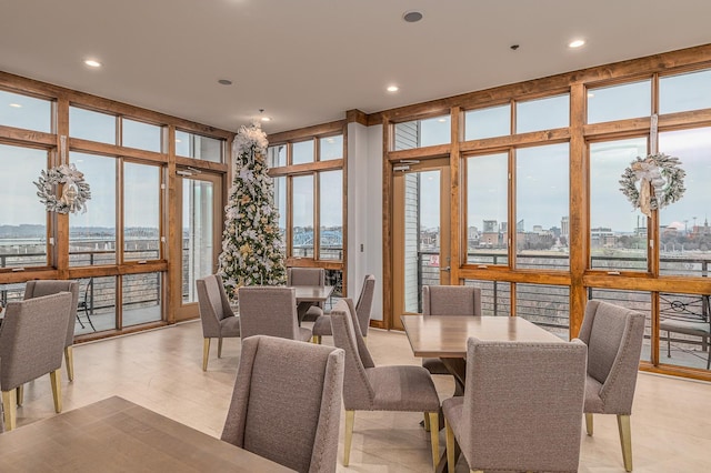 dining room with plenty of natural light and expansive windows