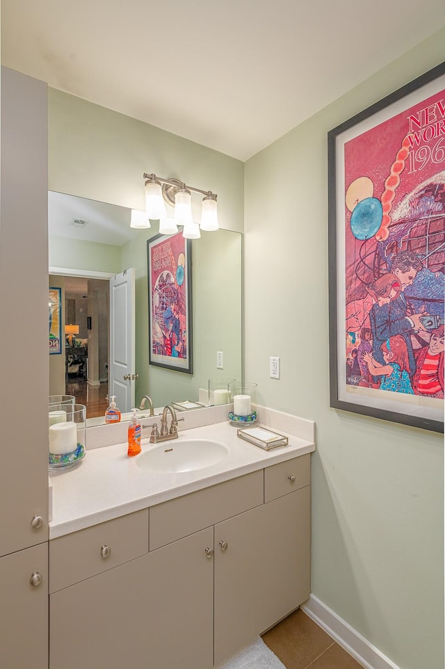 bathroom with vanity and tile patterned flooring