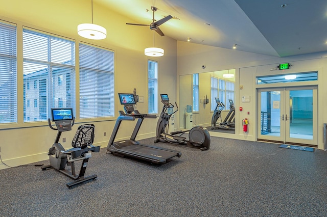 workout area featuring high vaulted ceiling, ceiling fan, and french doors