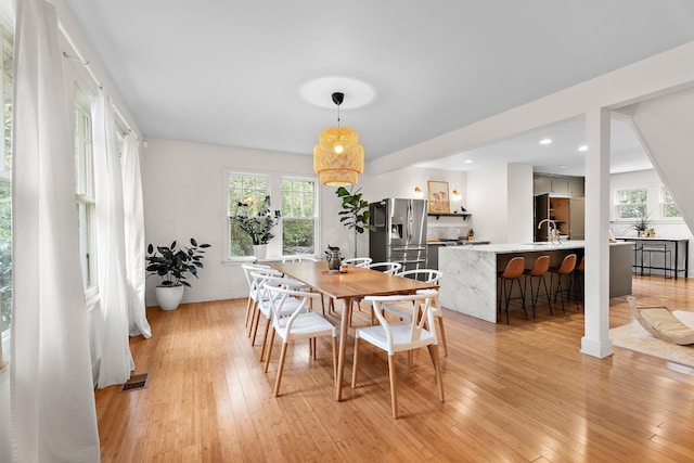 dining area featuring light hardwood / wood-style floors