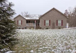 ranch-style house with covered porch