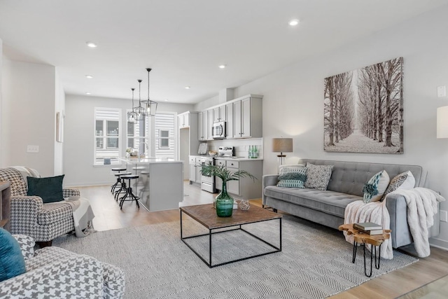 living room featuring light wood-type flooring