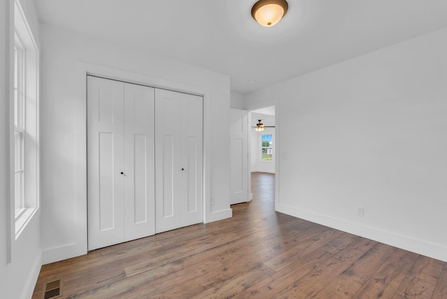 286 Wilhite, Doyle, TN 38559 - unfurnished bedroom with wood finished floors, baseboards, and a closet