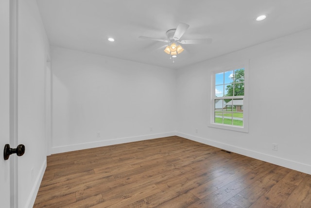 286 Wilhite, Doyle, TN 38559 - unfurnished room featuring hardwood / wood-style floors, baseboards, ceiling fan, and recessed lighting