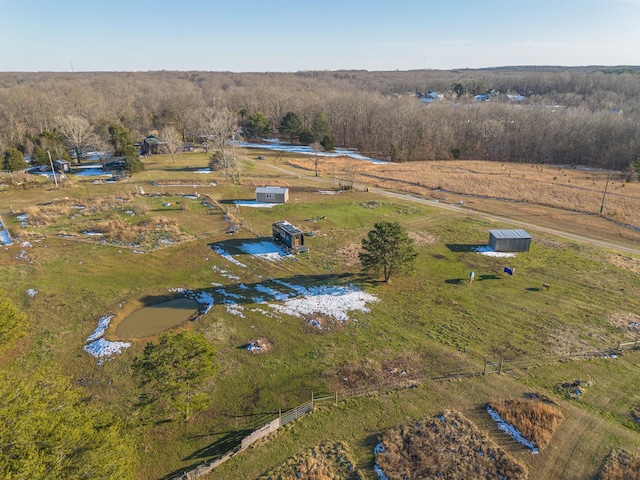 birds eye view of property with a rural view and a water view