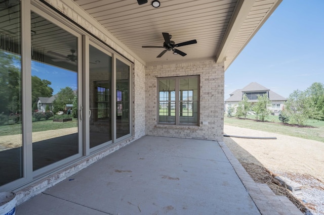 view of patio / terrace featuring ceiling fan