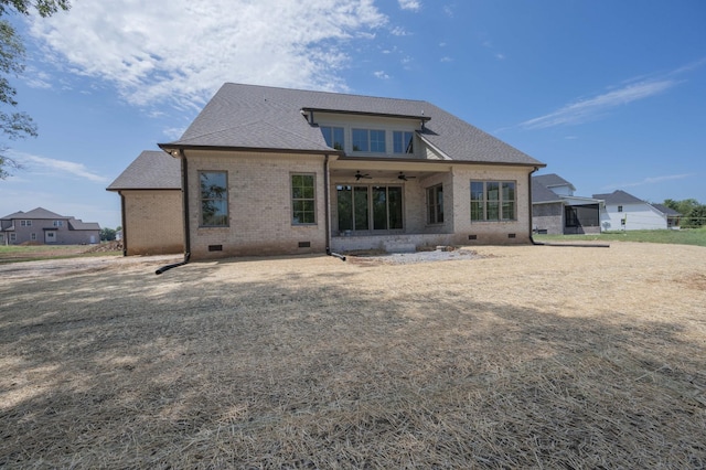 rear view of property with ceiling fan