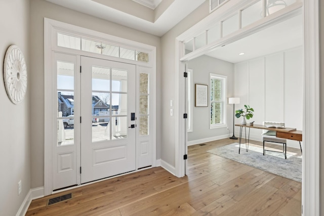 entrance foyer featuring light hardwood / wood-style floors