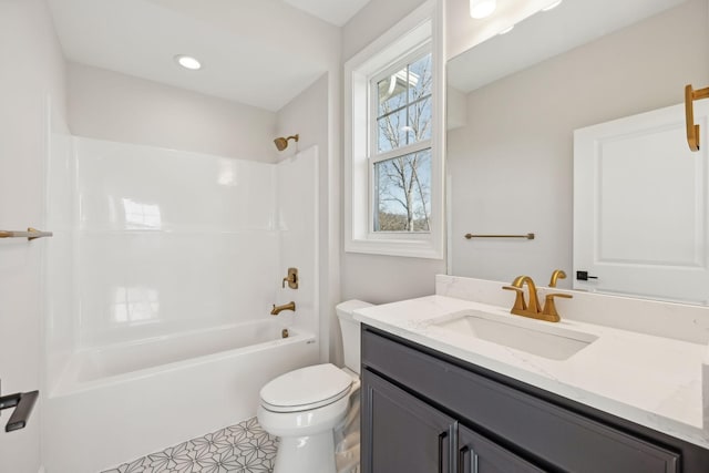 full bathroom with shower / tub combination, tile patterned flooring, vanity, and toilet