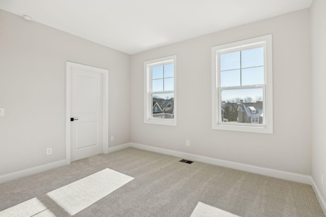 view of carpeted spare room