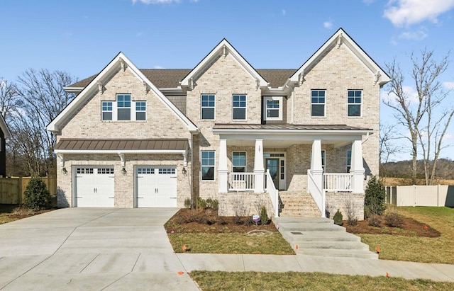 view of front facade featuring a porch and a garage