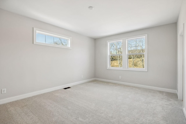 empty room with carpet floors