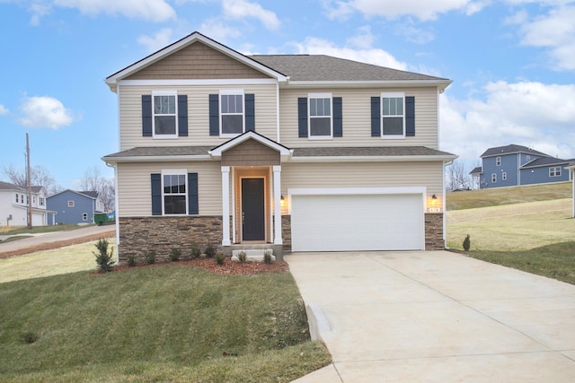 view of front facade featuring a front yard and a garage