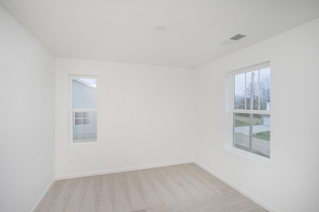 view of carpeted spare room