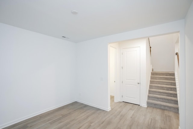 unfurnished room featuring light hardwood / wood-style floors