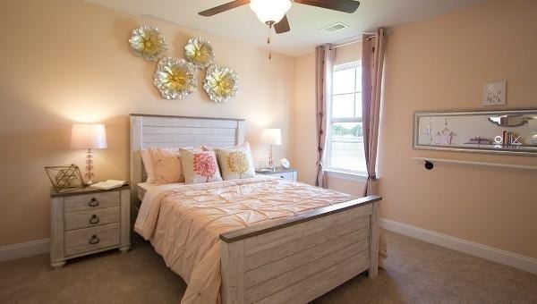 carpeted bedroom with ceiling fan