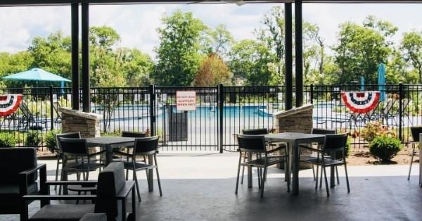 view of patio featuring a community pool