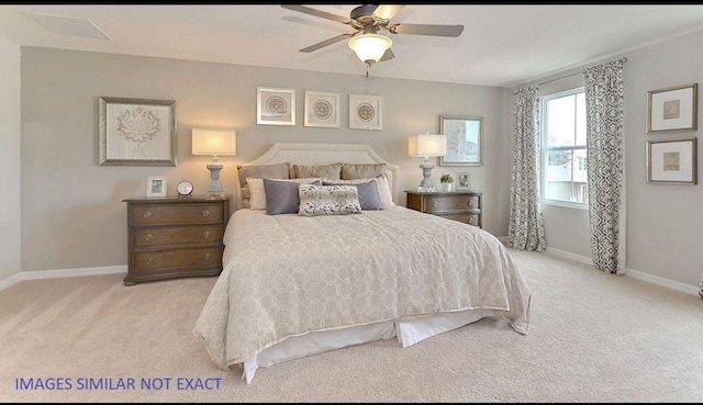 bedroom featuring ceiling fan and light colored carpet