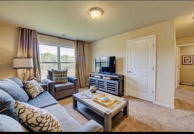 living room with light colored carpet