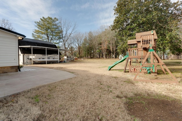 view of yard featuring a playground