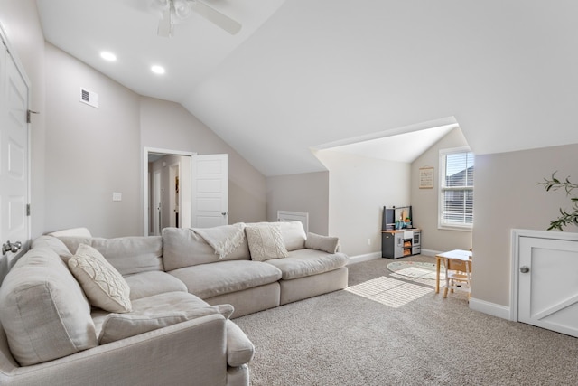 carpeted living room featuring ceiling fan and vaulted ceiling