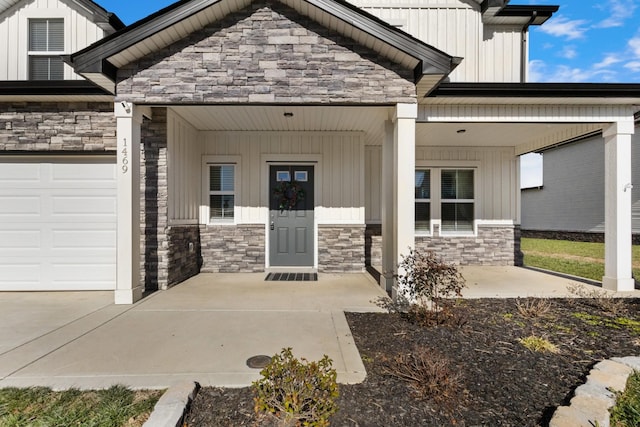 property entrance featuring a porch and a garage