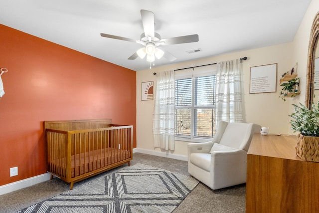 carpeted bedroom with ceiling fan