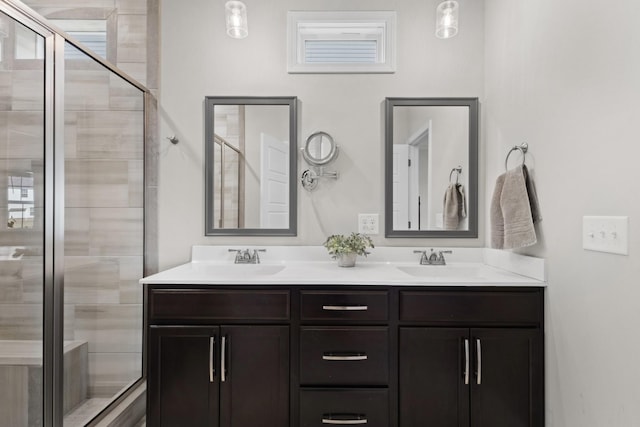 bathroom with vanity and walk in shower