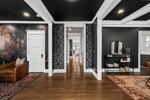 entryway with crown molding and dark hardwood / wood-style floors