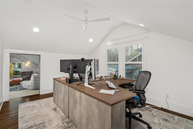 home office featuring dark hardwood / wood-style flooring, ceiling fan, vaulted ceiling, and a healthy amount of sunlight