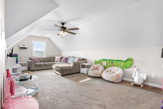 living room featuring carpet floors, ceiling fan, and vaulted ceiling