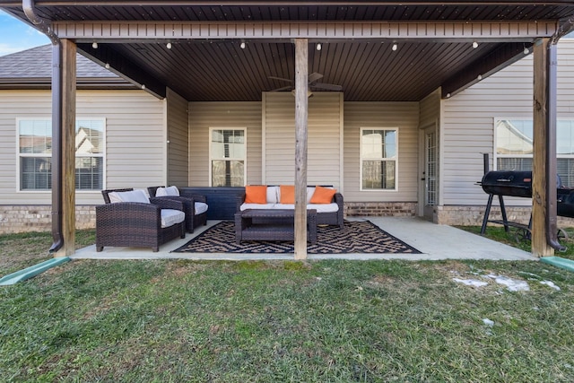 view of patio / terrace with ceiling fan and outdoor lounge area