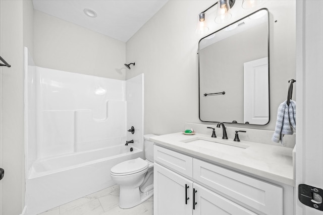 full bathroom with vanity, toilet, marble finish floor, and shower / washtub combination