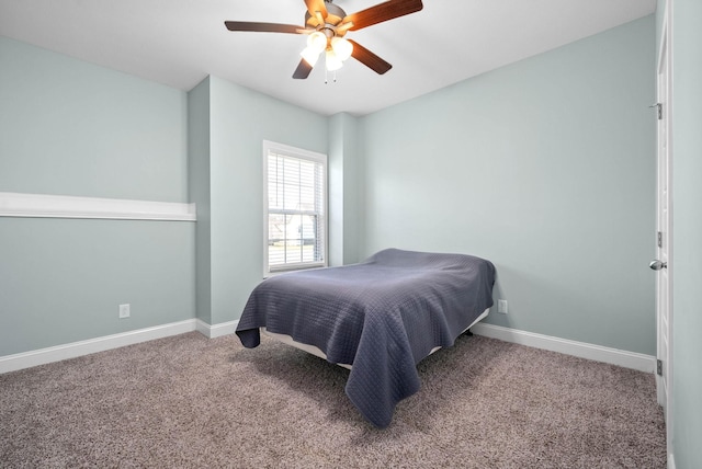 bedroom with ceiling fan and carpet flooring