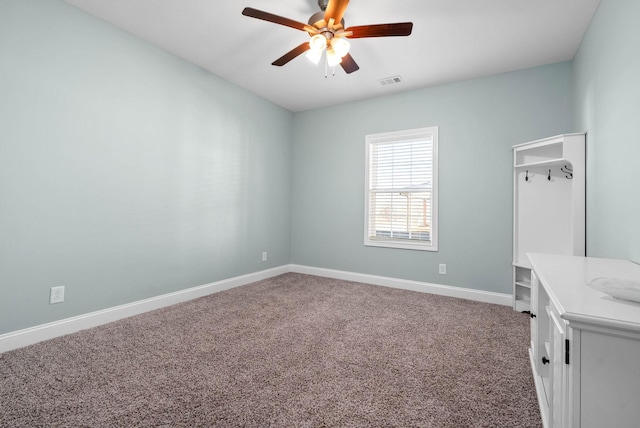 unfurnished room with carpet