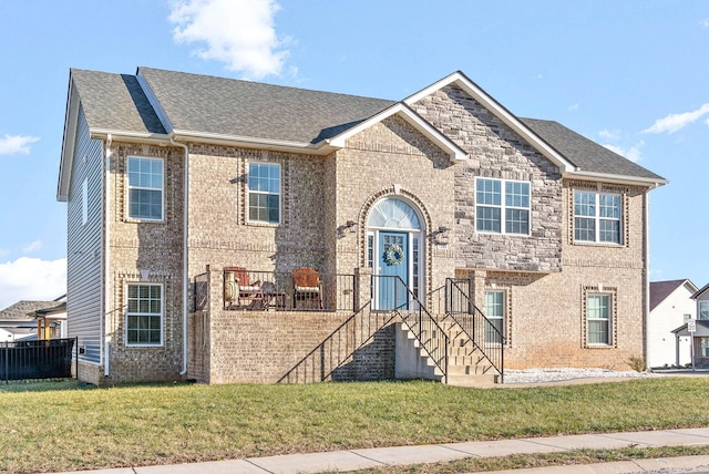 view of front of home with a front lawn